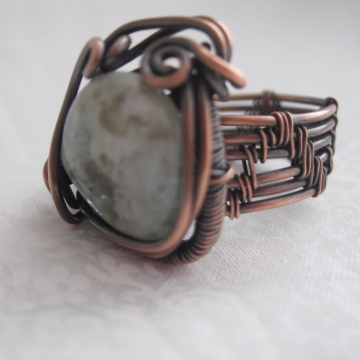 Natural Aquamarine Stone wrapped with Copper Weaving Natural Aquamarine Stone wrapped with Copper Weaving